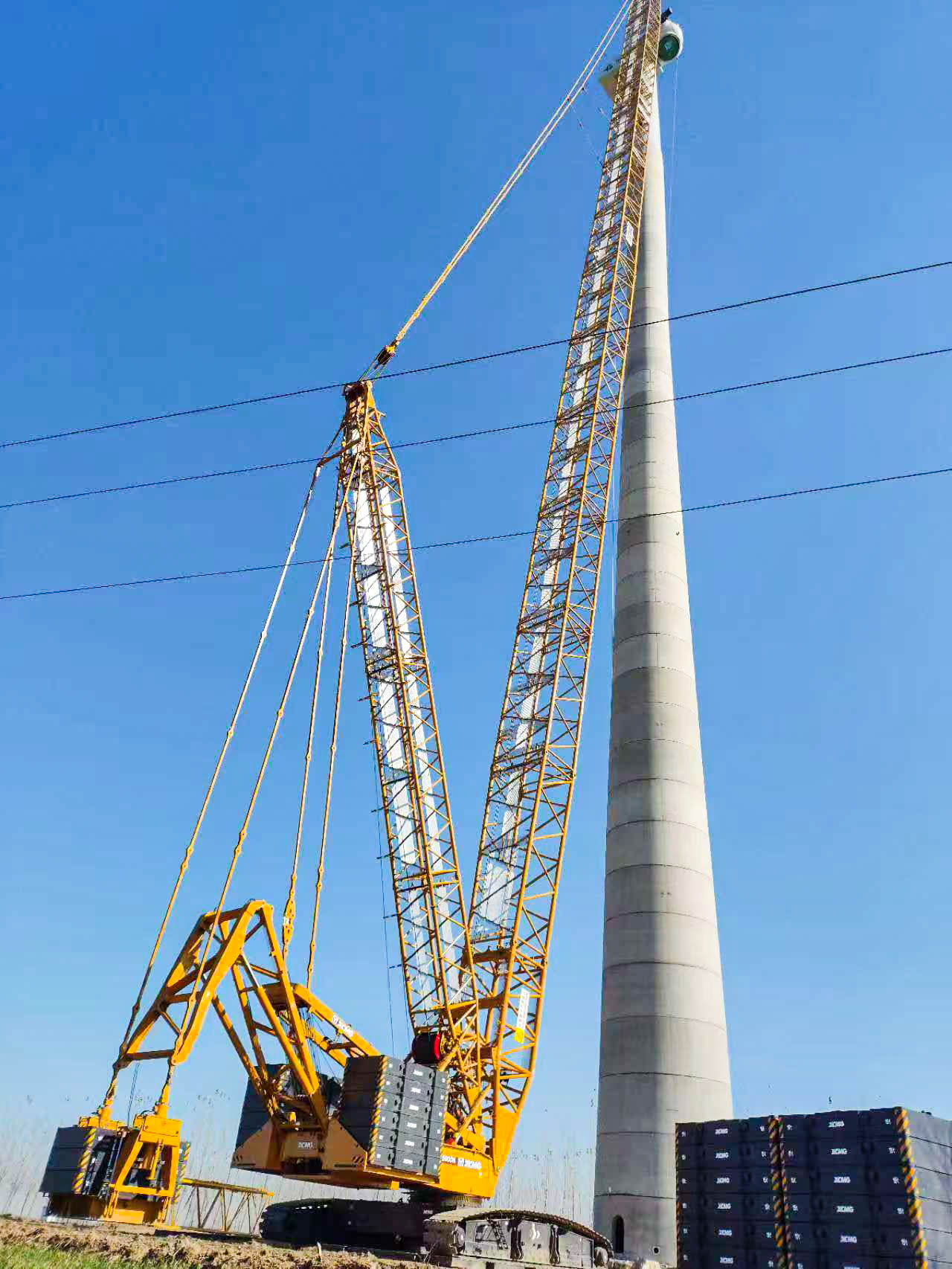 160米高空精準(zhǔn)“搭積木”：徐工XLC15000M分體吊裝6.25兆瓦風(fēng)機全紀錄